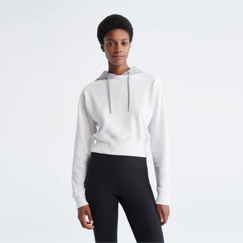 CK performance hooded sweatshirt. white and gray. Size M